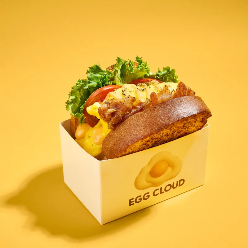 The Garlic BLT Cloud egg sandwich with bacon, lettuce and tomato